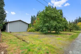 Shop is at the back of the property.