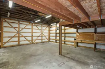 Tons of work space with loft above.