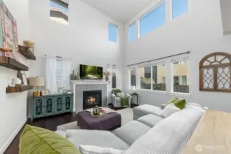 Great room w/ gas fireplace and expansive ceilings