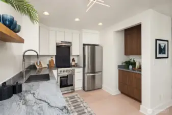 Beautiful new quartz counters and new cabinets. Tons of functionality in this redesigned kitchen, it lives large!