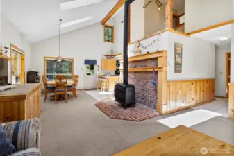 Open-concept main living space with easy flow to dining and kitchen.