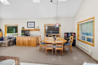 Combined living/dining space with flexible layout options.