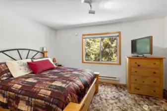 Comfortable primary bedroom with space to unwind.