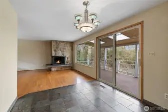 This view is from the dining room looking into the living room. The slider to the right gives access to the huge covered deck.