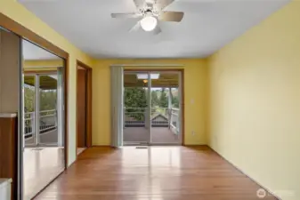 Primary bedroom has 3/4 bath , and a slider onto the very cool deck.