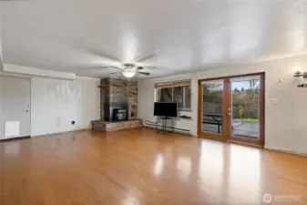 This is the downstairs unit living area. It has access to the covered patio & back yard as well as a 2 car garage!