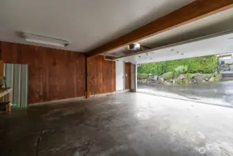 The main floor 2 car garage has a door leading to the covered porch so you can stay dry during rainy days!