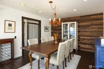 The formal dining room will hold a large table and chairs ready to host several dinner guests.