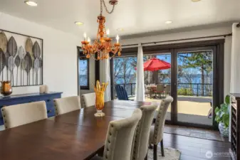 While you dine, you can enjoy amazing views out the large floor to ceiling glass doors that step out to the balcony deck.