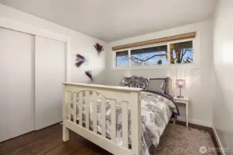 On the upper level are three more bedrooms.