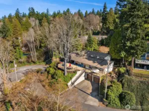 Two car attached garage with ample driveway parking.