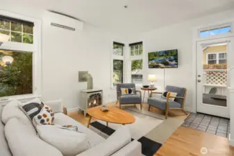 The main room flows out to a sunny deck on the same level.