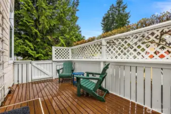 The sunny deck opens off the main room and is set well above ground level, providing excellent light and privacy.