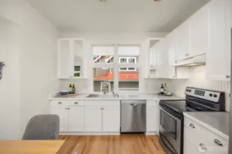 A new, larger stainless steel sink and garbage disposal make meal cleanup easy.