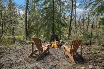 Relax by the fire pit and enjoy the tranquil outdoor setting