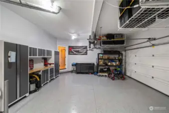 Epoxy floors and updated ligthing and storage in the 3 car garage!