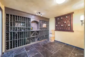 Tuscan themed wine cellar on lower level, basement area. Exterior access.