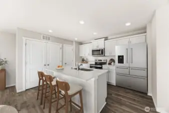 Photo is of a similar home. Colors and materials may vary.