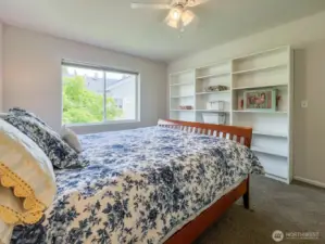 This charming, quiet third bedroom - also on the second floor- could be fitted with built-ins, a workstation, etc.! It could also function as a full office, exercise, or hobby room with a daybed or murphy bed.