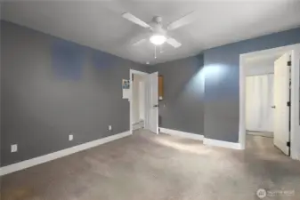 opposite view of primary bedroom virtually decluttered