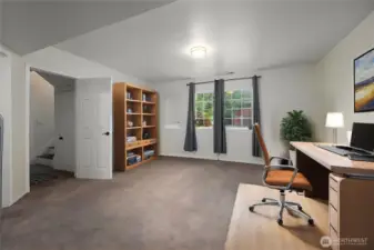 opposite side of downstairs living space Virtually staged