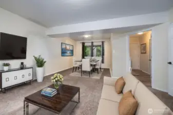 opposite side of downstairs living space Virtually staged