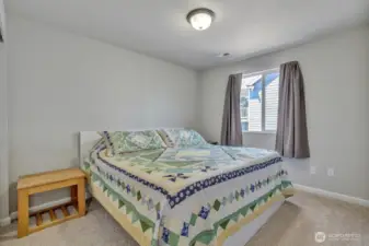 One of three secondary bedrooms