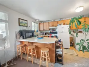 Eating area and kitchen of unit 2.