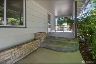 Covered porch entrance off living room