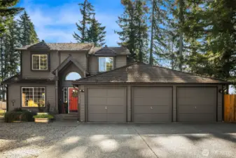 3 car garage plus a 30' X 50' X 16' shop.