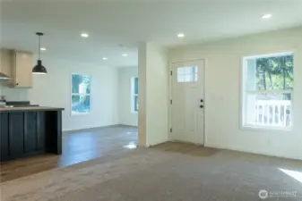 Living room looking into kitchen