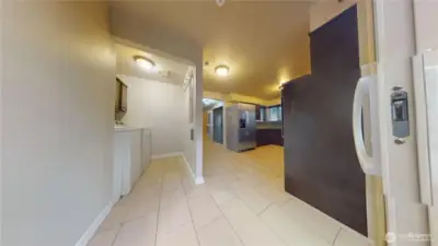 Utility room by slider for easy access to DADU occupant