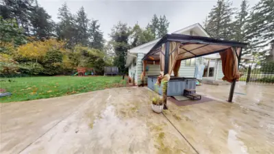 Hot tub, gazebo, play system and trampoline all stay with the property