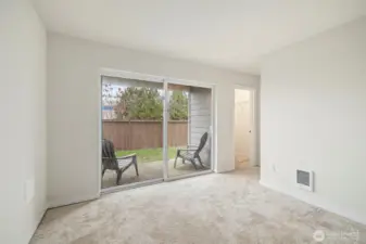 Large slider to back yard, letting in lots of light.
