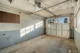 well-equipped with a ventilation system, the garage was utilized as a shop in the past