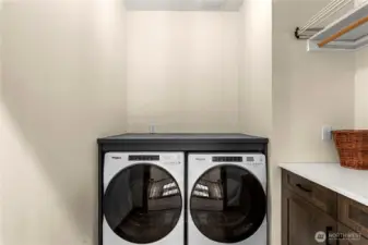 Laundry with Folding Table, Custom Cabinet & Hanging Rod