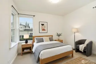 Main Level Bedroom. Digitally staged.