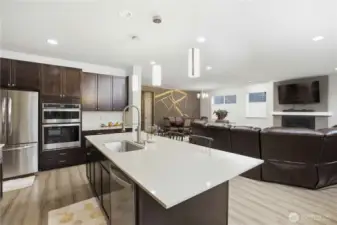 Kitchen flowing to living space.