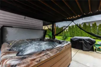 Second pergola covers this amazing 7 person hot tub on the expanded patio! I feel relaxed already!