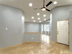 Flowing entertaining-style living and dining with theatre style ceiling lights throughout.