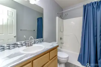 Nicely updated main bathroom.