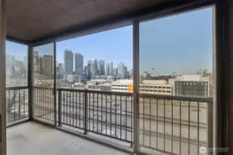 Enclosed balcony with epic downtown view.
