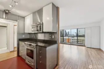 Stainless appliances and accents add to the modern finishes.