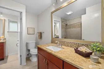 Well-appointed bath with extended vanity, updated fixtures, and stylish finishes for everyday comfort.