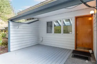 The covered deck has skylights to let the light in!  Power and water for a hot tub!