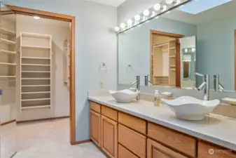 The attached bath features beautiful vessel sinks.