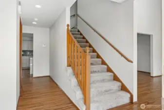 Entry with engineered hardwood floors that extend throughout the main living areas.