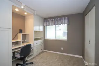 1st room on right down hall is the den/ office/ 3rd bedroom. A very flexible space.