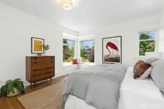 The primary suite occupies the entire south side of the second floor.