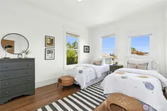 This bedroom features views to the east of the Cascades and the Holy Names HS Dome.